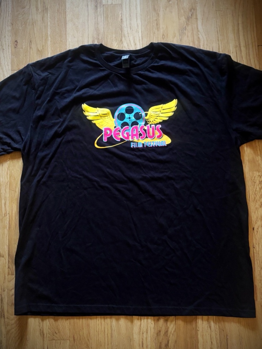 Pegasus Film Festival Gildan Black Tee with Yellow & Pink Souvenir Logo 2XL